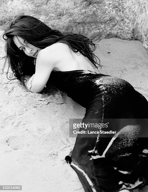 Madeleine Stowe Lying in the Sand