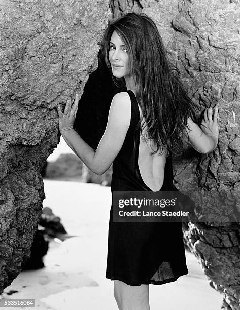 Madeleine Stowe by Beach Rocks