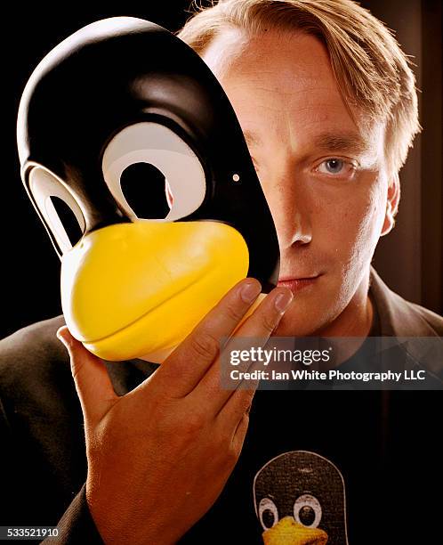 Linux Creator Linus Torvalds Holding Mask