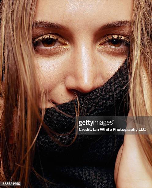 Eliza Dushku Covering Face with Turtleneck