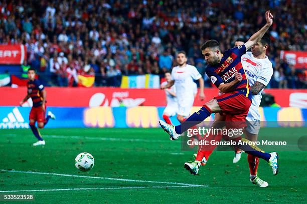 Jordi Alba of FC Barcelona scores their opening goal during the Copa del Rey Final match between FC Barcelona and Sevilla FC at Vicente Calderon...