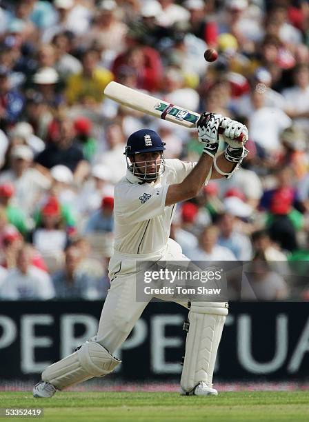 England captain Michael Vaughan hits out during day one of the Third npower Ashes Test match between England and Australia at Old Trafford on August...