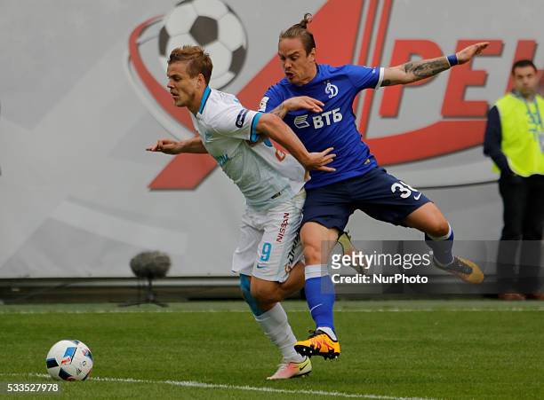 Aleksandr Kokorin of FC Zenit St. Petersburg and Andrey Yeshchenko of FC Dynamo Moscow vie for the ball during the Russian Football Premier League...