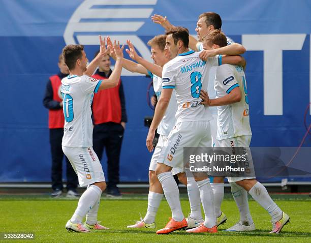 Artem Dzyuba of FC Zenit St. Petersburg celebrates his goal with teammates during the Russian Football Premier League match between FC Dynamo Moscow...