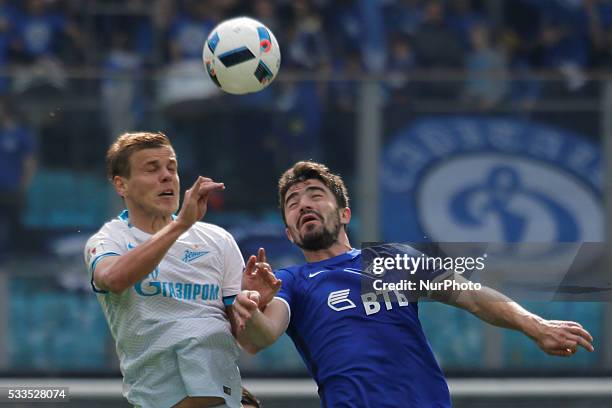 Aleksandr Kokorin of FC Zenit St. Petersburg and Anton Sosnin of FC Dynamo Moscow vie for a header during the Russian Football Premier League match...