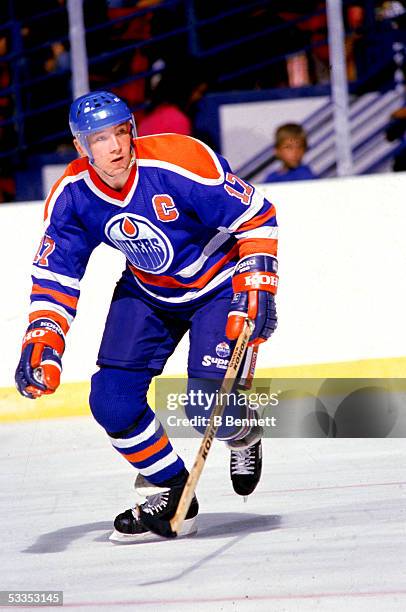 Finnish professional hockey player Jari Kurri, right wing for the Edmonton Oilers, on the ice during an away game, late 1980s.