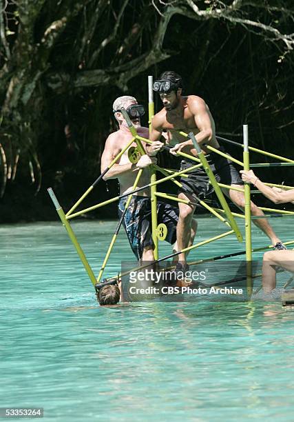 Castaways, Tom Westman, Caryn Groedel, Gregg Carey and Janu Tornell of the Koror tribe during the reward challenge, "Water Tower", during the 10th...