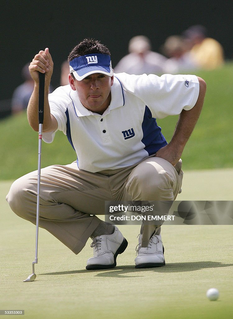 Ben Curtis of the US lines up his putt o