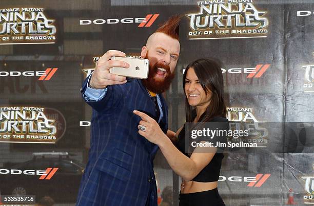 Actor Stephen Farrelly and actress Kachina Dechert attend the "Teenage Mutant Ninja Turtles: Out Of The Shadows" world premiere at Madison Square...