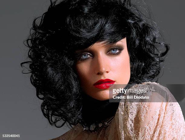 woman with black hair and red lip - red lipstick stock pictures, royalty-free photos & images