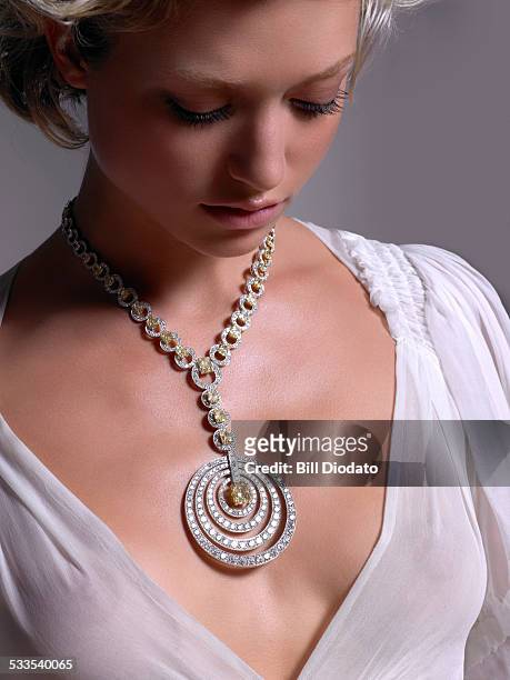 woman with diamond necklace - diamond necklace stock pictures, royalty-free photos & images