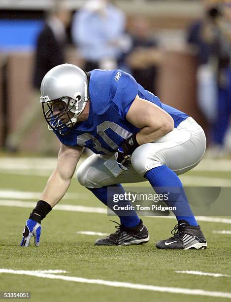 Running back Cory Schlesinger of the Detroit Lions lines up against the Indianapolis Colts at Ford Field on November 25, 2004 in Detroit, Michigan....