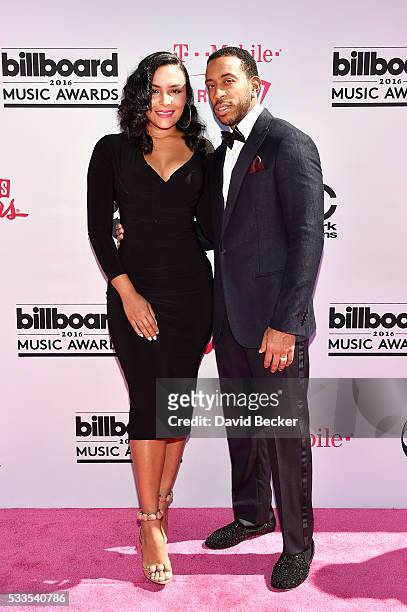 Model Eudoxie Mbouguiengue and co-host Ludacris attend the 2016 Billboard Music Awards at T-Mobile Arena on May 22, 2016 in Las Vegas, Nevada.