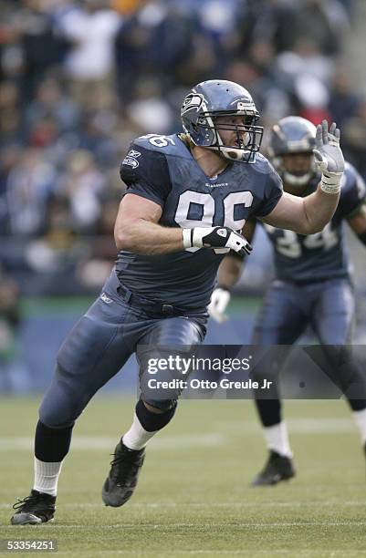 Defensive end Grant Wistrom of the Seattle Seahawks rushes the quarterback during the game against the Buffalo Bills at Qwest Field on November 28,...