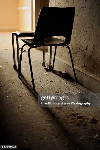 chair in abandoned hospital. - lucy shires - fotografias e filmes do acervo
