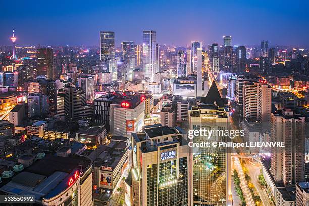 chengdu east skyline at night - chengdu stock-fotos und bilder