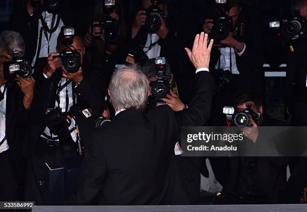 British director Ken Loach poses with the Palme d'Or for his movie 'I, Daniel Blake' during the Award Winners photocall at the 69th annual Cannes...