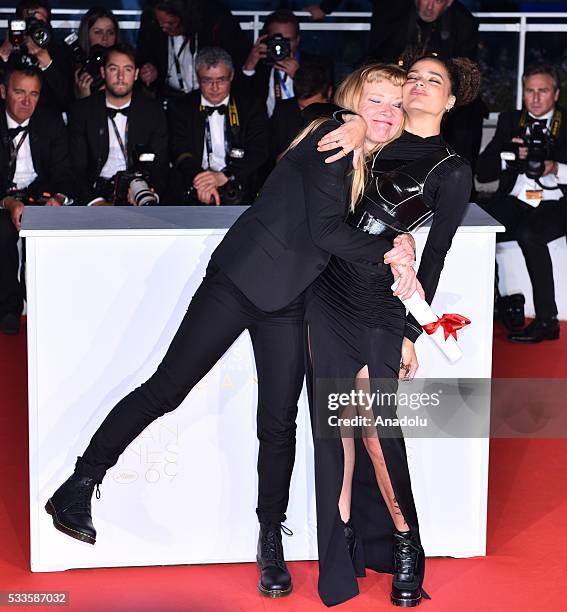 British director Andrea Arnold poses with US actress Sasha Lane after receiving the Jury Prize for her movie 'American Honey' during the Award...