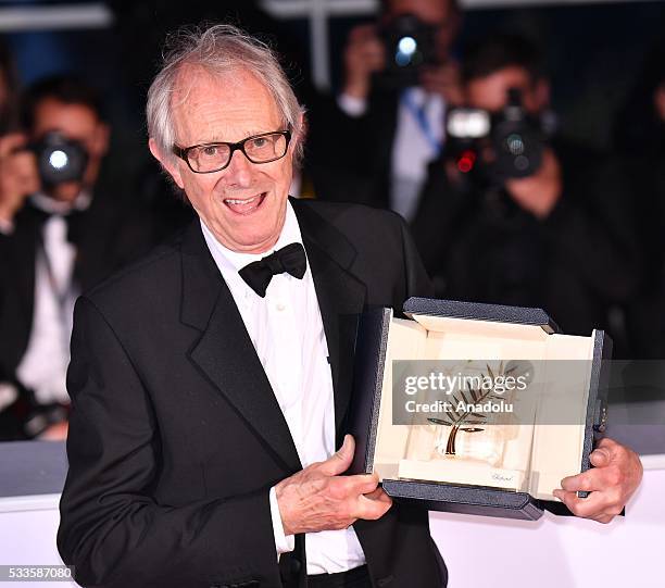 British director Ken Loach poses with the Palme d'Or for his movie 'I, Daniel Blake' during the Award Winners photocall at the 69th annual Cannes...