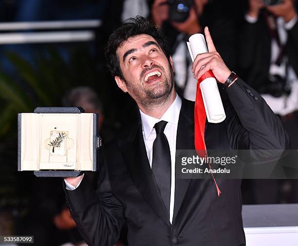 Iranian actor Shahab Hosseini poses as the Best Performance by an Actor award for 'Forushande' during the Award Winners photocall at the 69th annual...