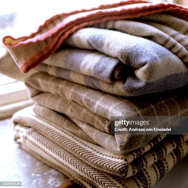 herefordshire home of craftswoman of leather goods - pile of blankets stock pictures, royalty-free photos & images