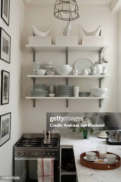 london home of interior designer hugh henry - narrow kitchen stock pictures, royalty-free photos & images