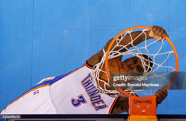 Dion Waiters of the Oklahoma City Thunder dunks in the first half against the Golden State Warriors in game three of the Western Conference Finals...