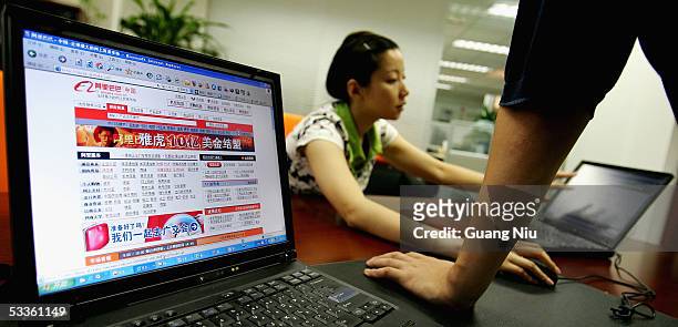 Wendy Li, vice director of business development department of Ali Baba works at the office of Alibaba technology Co., Lth on August 12, 2005 in...