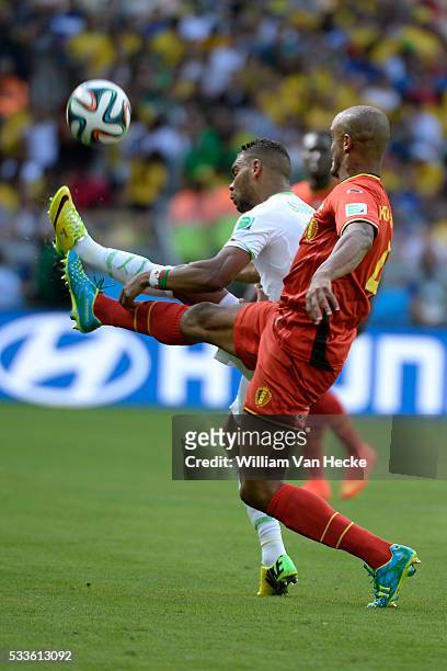 El Arbi Hillel Soudani of Algeria and Vincent Kompany of Belgium during a FIFA 2014 World Cup Group H match between Belgium and Algeria at the...