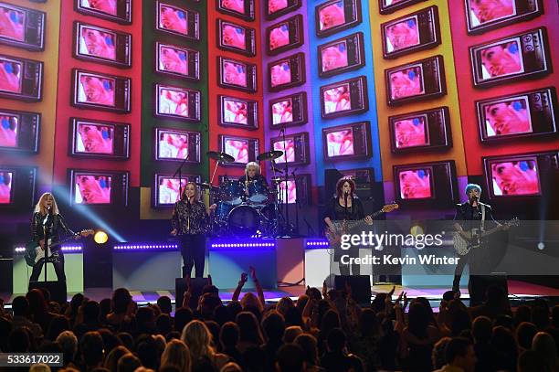 Musicians Charlotte Caffey, Belinda Carlisle, Gina Schock, Paula Jean Brown and Jane Wiedlin of The Go-Go's perform onstage during the 2016 Billboard...