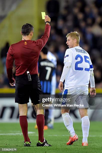 Valeriy Fedorchuk, midfielder of FC Dnipro is shown a yellow card by referee Skomina during the UEFA Europa League, Quarter-finals, first leg match...