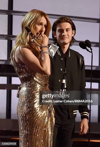 Honoree Celine Dion accepts the Icon Award from Rene-Charles Angelil onstage during the 2016 Billboard Music Awards at T-Mobile Arena on May 22, 2016...