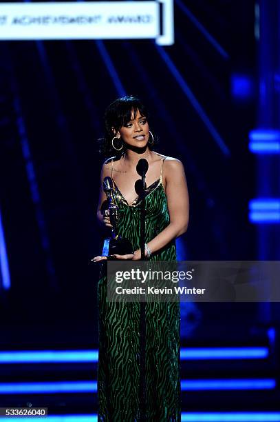 Recording artist Rihanna accepts the Billboard Chart Achievement Award onstage during the 2016 Billboard Music Awards at T-Mobile Arena on May 22,...