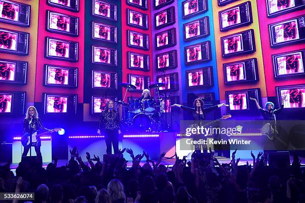 Musicians Charlotte Caffey, Belinda Carlisle, Gina Schock, Paula Jean Brown and Jane Wiedlin of The Go-Go's perform onstage during the 2016 Billboard...