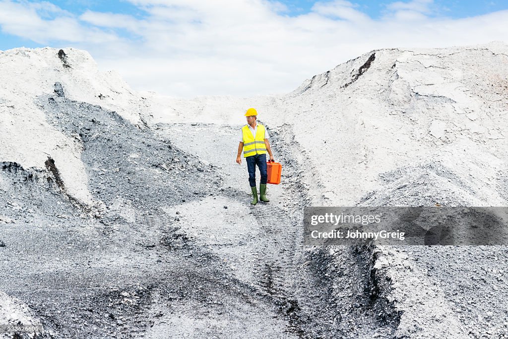 Man walking through industrial site