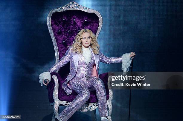 Recording artist Madonna performs a tribute to Prince onstage during the 2016 Billboard Music Awards at T-Mobile Arena on May 22, 2016 in Las Vegas,...