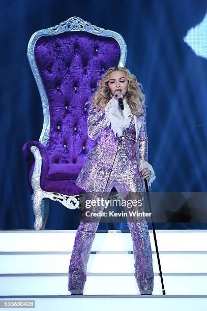 Recording artist Madonna performs a tribute to Prince onstage during the 2016 Billboard Music Awards at T-Mobile Arena on May 22, 2016 in Las Vegas,...