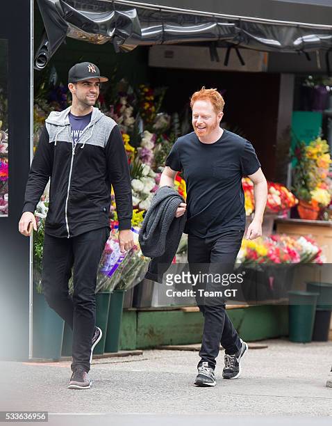 Jesse Tyler Ferguson and Justin Mikita are seen on May 22, 2016 in New York City.