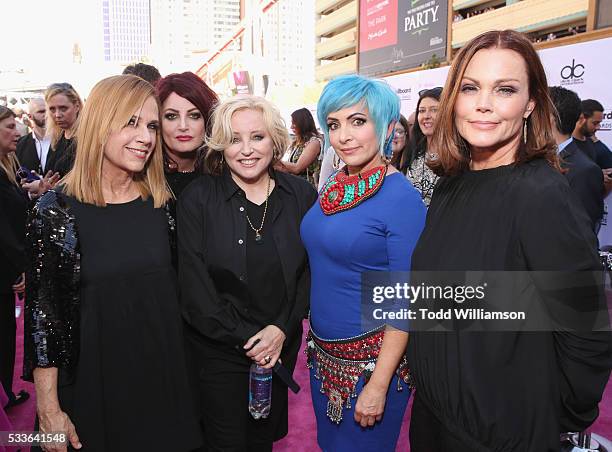 Musicians Charlotte Caffey, Abby Travis, Gina Schock, Jane Wiedlin, and Belinda Carlisle of The Go-Go's attend the 2016 Billboard Music Awards at...