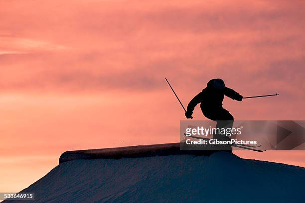 sunset ski grind - freestyle skiing stock pictures, royalty-free photos & images