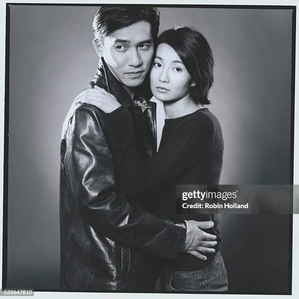 Maggie Cheung and Tony Leung