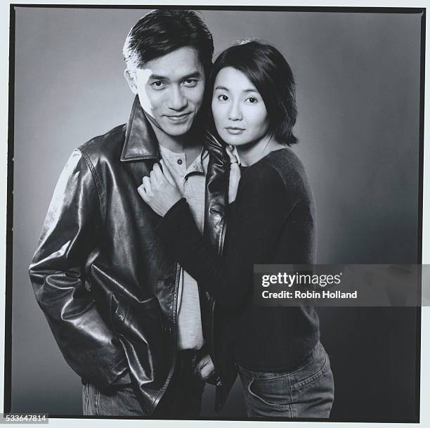 Maggie Cheung and Tony Leung