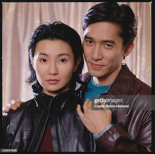 Maggie Cheung and Tony Leung