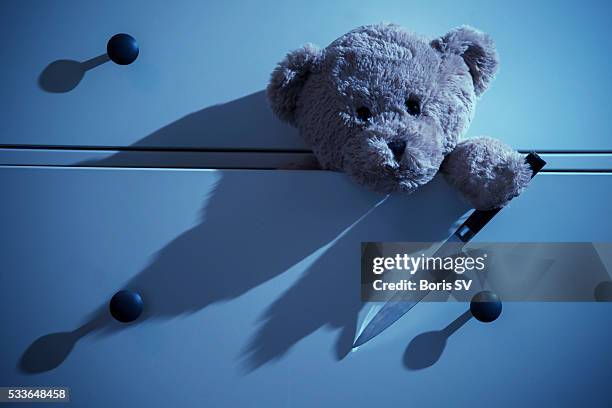 teddy crawling out of chest of drawers - bad dresser stock pictures, royalty-free photos & images