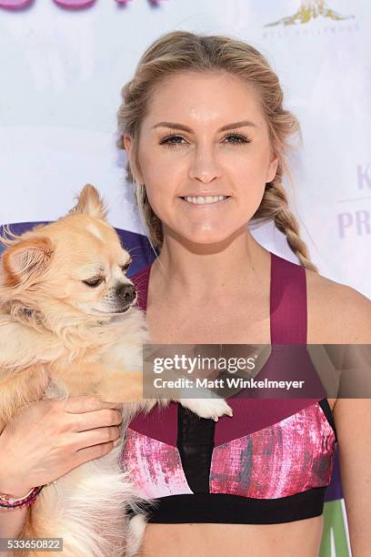 Fitness personality Rebecca Louise attends the World Dog Day Celebration at The City of West Hollywood Park on May 22, 2016 in West Hollywood,...