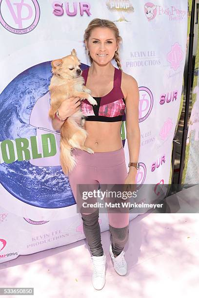 Fitness personality Rebecca Louise attends the World Dog Day Celebration at The City of West Hollywood Park on May 22, 2016 in West Hollywood,...