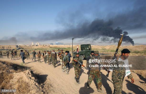 Iraqi pro-government forces advance towards the city of Fallujah on May 23 as part of a major assault to retake the city from Islamic State group....