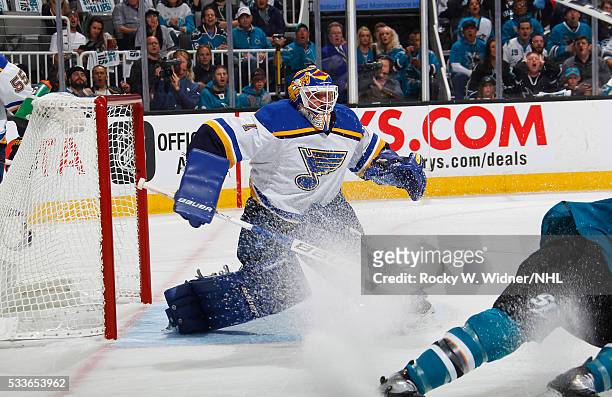 Brian Elliott of the St. Louis Blues defends the net against the San Jose Sharks in Game Three of the Western Conference Finals during the 2016 NHL...