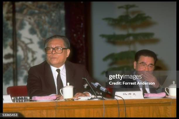 New Communist Party chief Jiang Zemin, , & PM Li Peng at press conference.