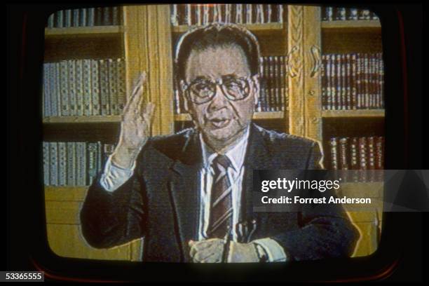 Screen image of PM Li Peng annoucing decision to lift martial law in Beijing, on evening news program.